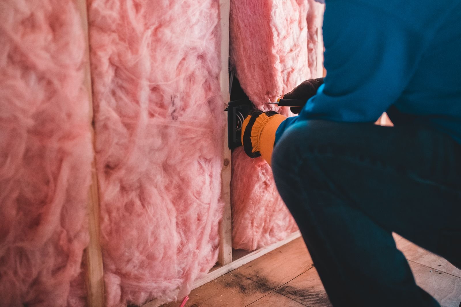 Insulation batts fitted between wall studs